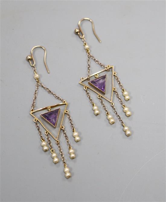 A pair of early 20th century yellow metal, amethyst and seed pearl set drop earrings and two 9ct ear wires.